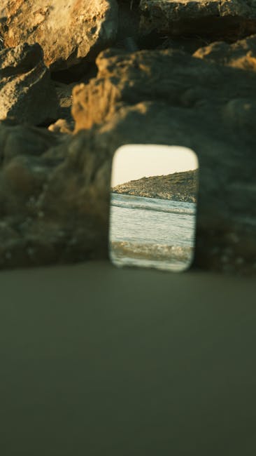 A small mirror reflecting a landscape representing new perspectives in retail blogging